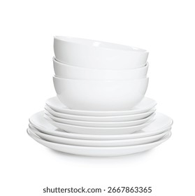 Stack of clean dishware isolated on white