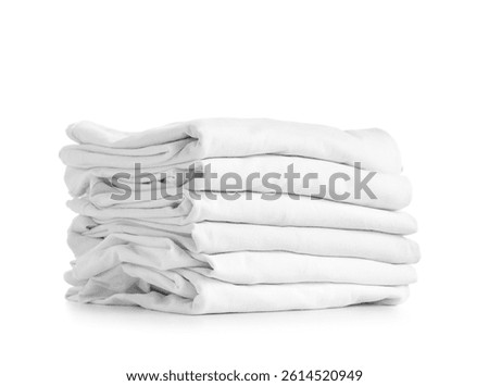 Stack of clean folded clothes isolated on white background