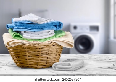 Stack of clean sheets and cloth in laundry room