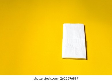 A stack of clean, white dry tissues arranged neatly on a surface. Soft texture and hygienic appearance, ideal for personal care, hygiene, or household use. Minimalist background emphasizes cleanlines