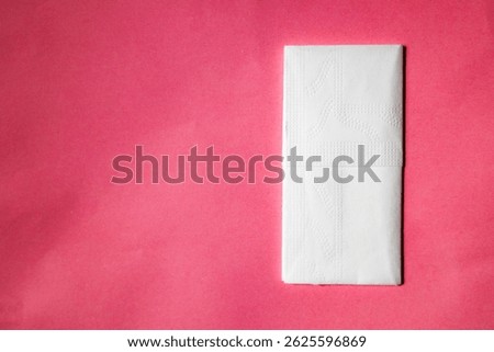 A stack of clean, white dry tissues arranged neatly on a surface. Soft texture and hygienic appearance, ideal for personal care, hygiene, or household use. Minimalist background emphasizes cleanlines