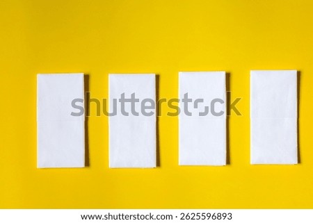 A stack of clean, white dry tissues arranged neatly on a surface. Soft texture and hygienic appearance, ideal for personal care, hygiene, or household use. Minimalist background emphasizes cleanlines