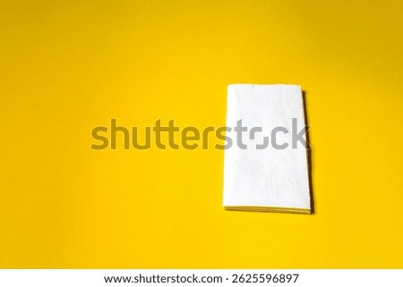 A stack of clean, white dry tissues arranged neatly on a surface. Soft texture and hygienic appearance, ideal for personal care, hygiene, or household use. Minimalist background emphasizes cleanlines