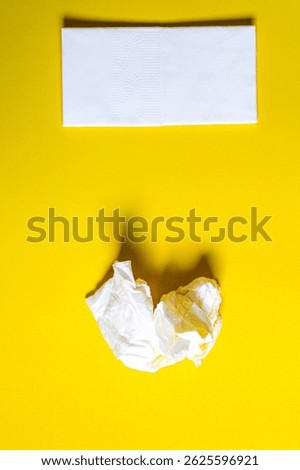 A stack of clean, white dry tissues arranged neatly on a surface. Soft texture and hygienic appearance, ideal for personal care, hygiene, or household use. Minimalist background emphasizes cleanlines