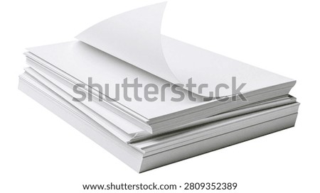 Stack of clean white paper sheets with one page curled at the corner