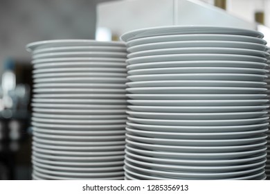 stack of clean white plates in a restaurant. Event prepare details