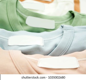 A stack of close-up colourful t-shirt 