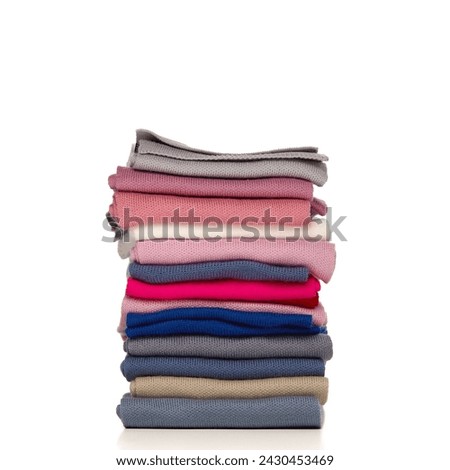 a stack of clothes on a white background of isolate