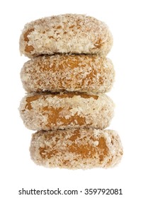 A Stack Of Coconut Flaked Plain Donuts Isolated On A White Background.