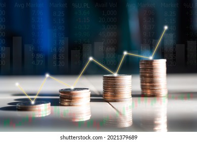 Stack coin with Graph, candlestick chart stock market and data trade background. planing earn money investment and saving money future for 2022 new year. finance and business. - Shutterstock ID 2021379689