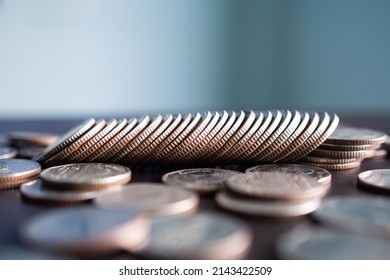 Stack coin on wooden background. pile thai cash and blur floor bank account. plan investment income for 2023 new year. business or finance concept. - Shutterstock ID 2143422509