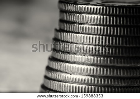 Stack of coins black and white macro