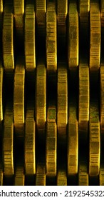 Stack Of Coins Close Up. Coin Texture. Business Vertical Background Made Of Many Coin Edges. Economy Or Bank Phone Wallpaper. Abstract Money Wall. Taxes, Credit And Currency Exchange. Macro