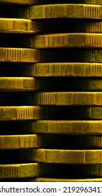 Stack Of Coins Close Up. Coin Texture. Business Vertical Background Made Of Many Coin Edges. Economy Or Bank Phone Wallpaper. Abstract Money Wall. Taxes, Credit And Currency Exchange. Macro