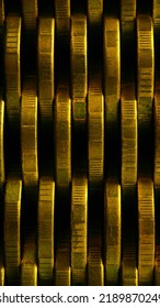 Stack Of Coins Close-up. Coin Texture. Business Vertical Background Made Of Many Coin Edge. Economy Or Bank Phone Wallpaper. Abstract Money Wall. Tax, Credit And Currency Change. Macro