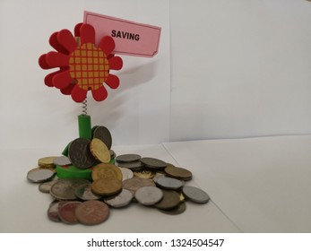 Stack of coins of multiple face value for saving, instill the value of saving money among young children. 