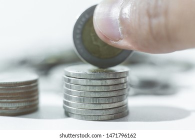 Stack coins on the white scene