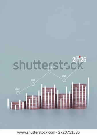 Stack of coins with virtual increasing graph. The concept of business growth, Financial investment, Market stock, Profit return, Dividend and Business fund in year 2026