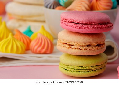 Stack of colored macaroon cookies close up