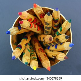A stack of colored pencils, selective focus.