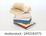 stack of colorful books on white background, open book, stack of books isolated on background, education, read, study, school, library, dictionary,university,High quality book photography