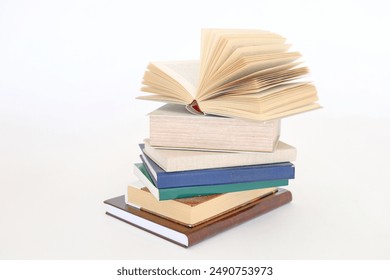 stack of colorful books on white background, open book, stack of books isolated on background, education, read, study, school, library, dictionary,university, - Powered by Shutterstock