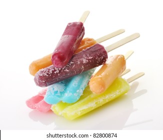 A Stack Of Colorful Ice Cream Pops