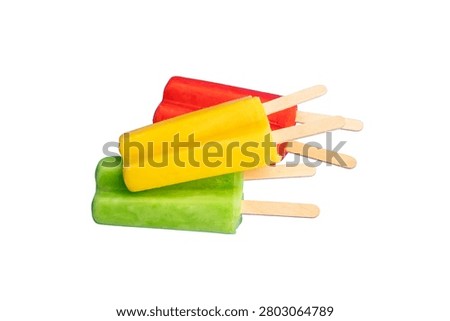 Stack of colorful ice pops on sticks