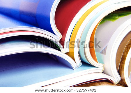 stack of the colorful magazines