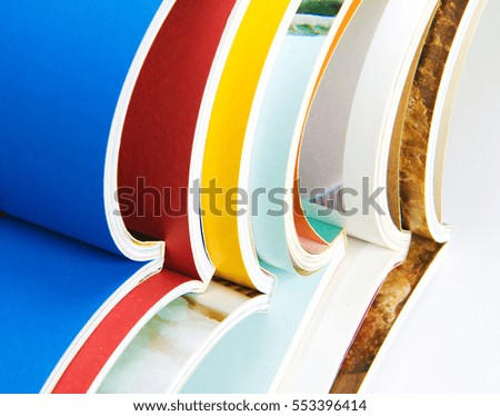 stack of the colorful magazines