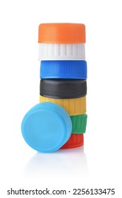 Stack of colorful plastic bottle cap isolated on white