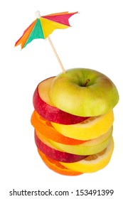 Stack Of Colorful Sliced Fruit With Umbrella From Above