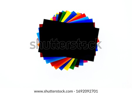 Stack of Coloured Cast Acrylic Sheet on white background, top view