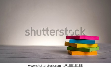 Stack of colourful post-it notes
