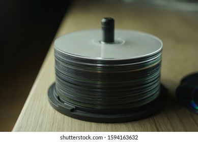 Stack Of Compact Discs On A Table