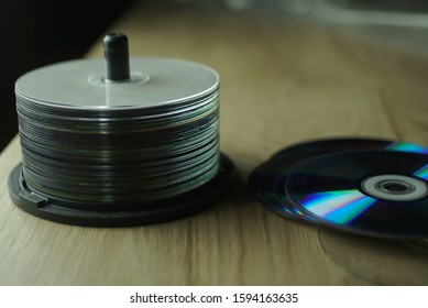 Stack Of Compact Discs On A Table