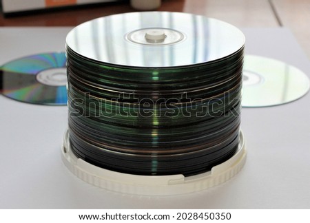 Stack of compact discs for storing files. 