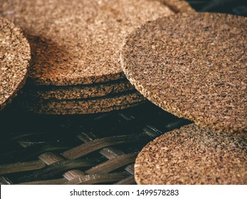 Stack Of Cork Coasters Sitting On A Table. Bar, Beer Mats, Drinks, Vintage Looking. 