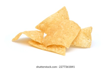 A stack of corn tortilla shells on white