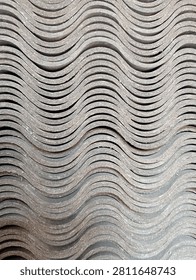 Stack of corrugated cement roofing sheets texture pattern
Close up of stacked wavy cement asbestos roof tiles. Industrial construction material pattern and texture for background.