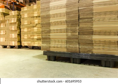 Stack of Corrugated paperboard texture in warehouse for industrial