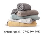 Stack of cozy blankets on white background
