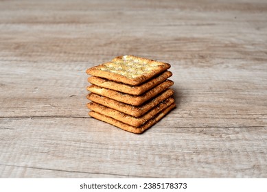 a stack of cracker biscuits arranged neatly