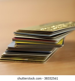 a stack of credit cards on the table top