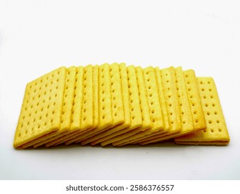 Stack of crispy biscuits isolated on a white background