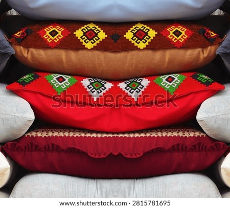 Stack Of Decorative Ethnic Throw Pillows Outside Home Decor Store