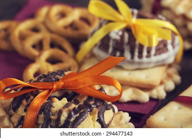 Stack of delisious cookies and biscuits folded with ribbon