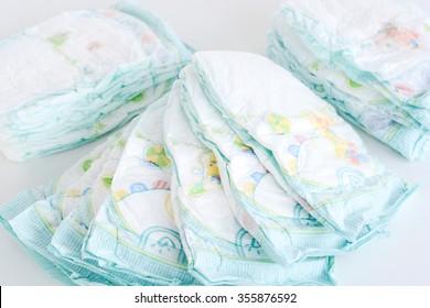 Stack of diapers isolated on white background