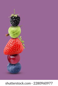 Stack of different fresh tasty berries and cherry on pale purple background, space for text