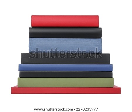 Stack of different hardcover books on white background